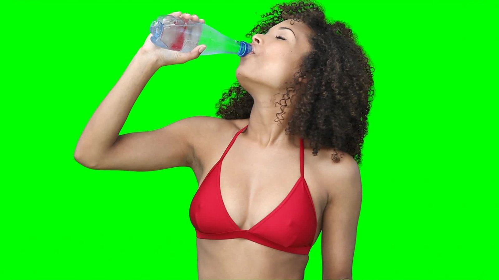 Fit Woman Drinking Water from Bottle on Green Screen preview